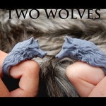 Modelo 3d de Dos lobos - juego de anillos para impresoras 3d