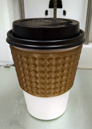  Coffee/tea cup sleeve - dimpled  3d model for 3d printers