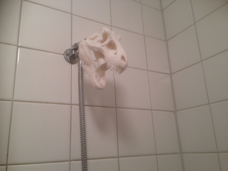 T-rex de la cabeza de ducha