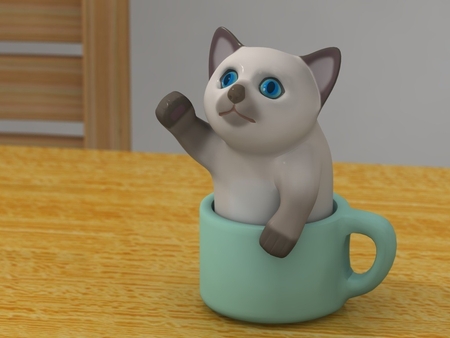 gatito en una taza